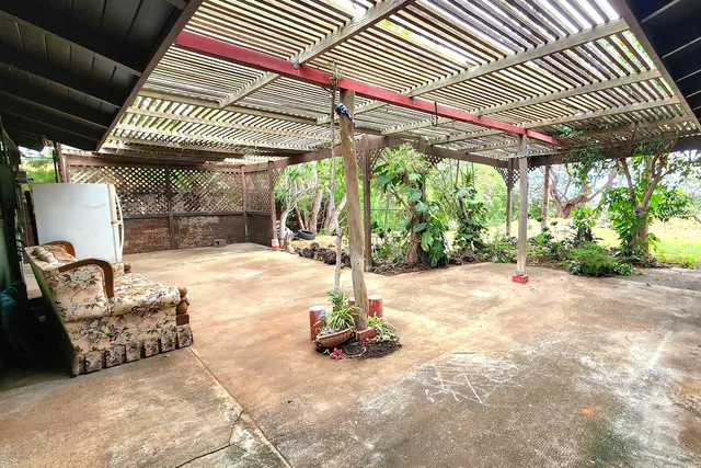 a swimming pool with a outdoor seating