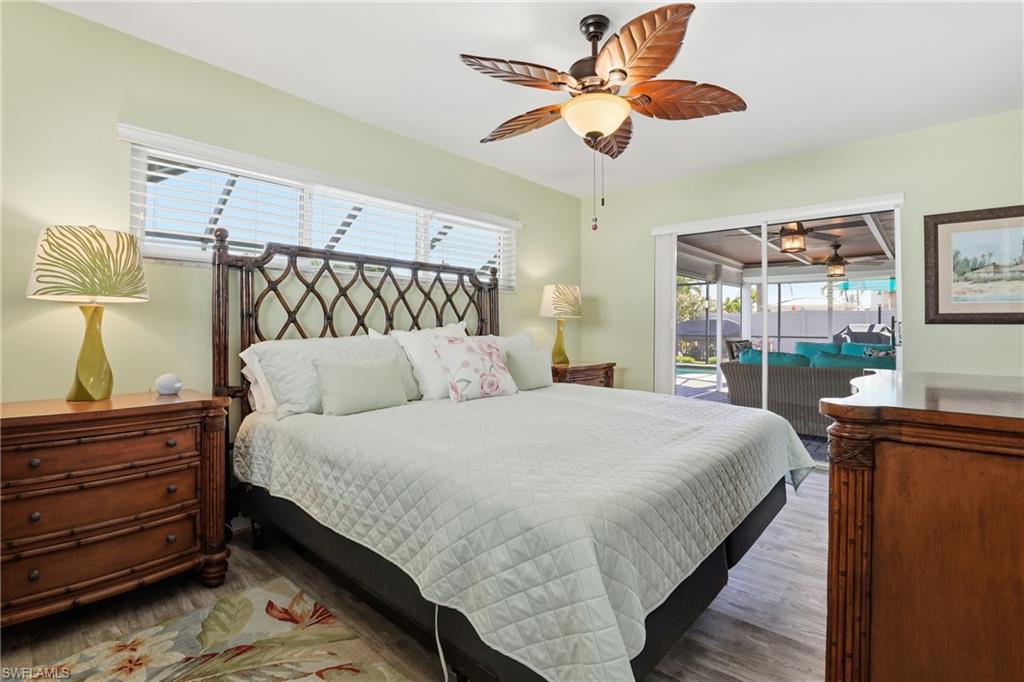 17 Palmview Boulevard Fort Myers Beach, FL 33931 - Photo 15 of 36 a bedroom with a bed and a window