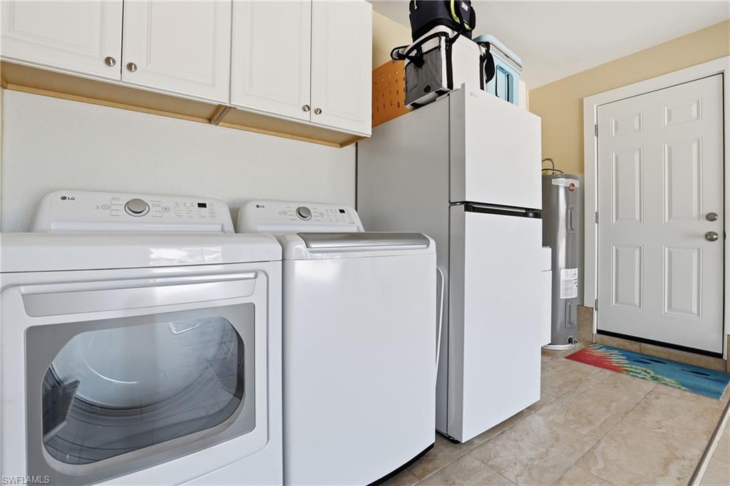17 Palmview Boulevard Fort Myers Beach, FL 33931 - Photo 36 of 36 a utility room with dryer and washer