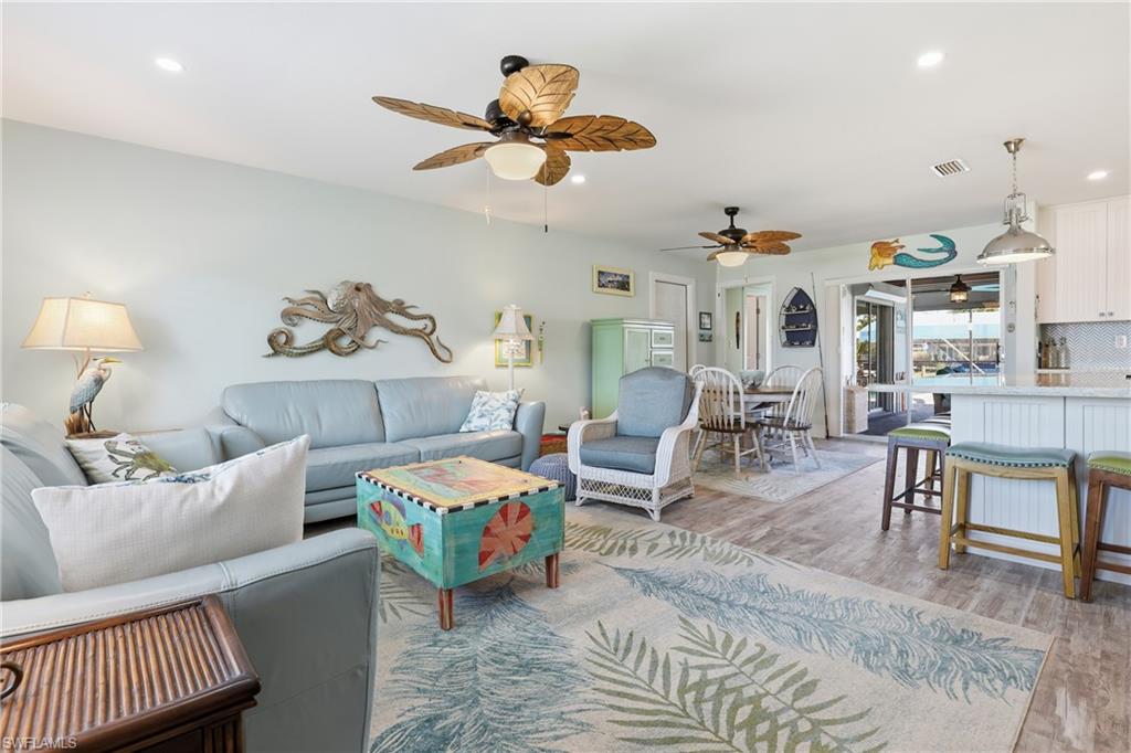 17 Palmview Boulevard Fort Myers Beach, FL 33931 - Photo 8 of 36 a living room with furniture and a rug