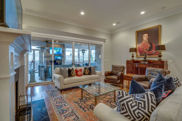 a bedroom with a bed and a night stand