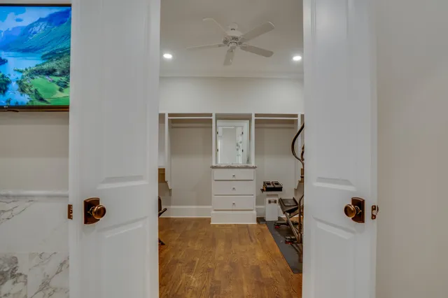 a bathroom with a toilet a sink and a window