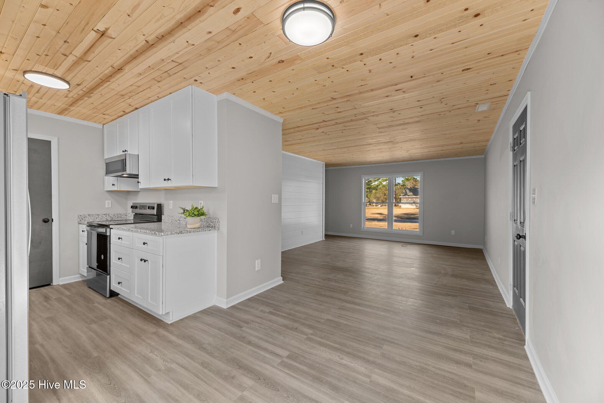 329 Tall Pine Road Havelock, NC 28532 - Photo 5 of 26 kitchen/dining/living rooms