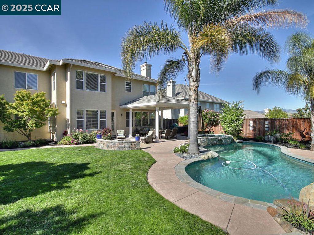 60 Foster Drive San Ramon, CA 94583 - Photo 1 of 1 a view of a house with swimming pool and a yard