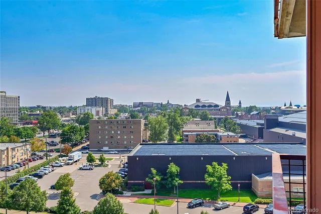 a view of a city with tall buildings