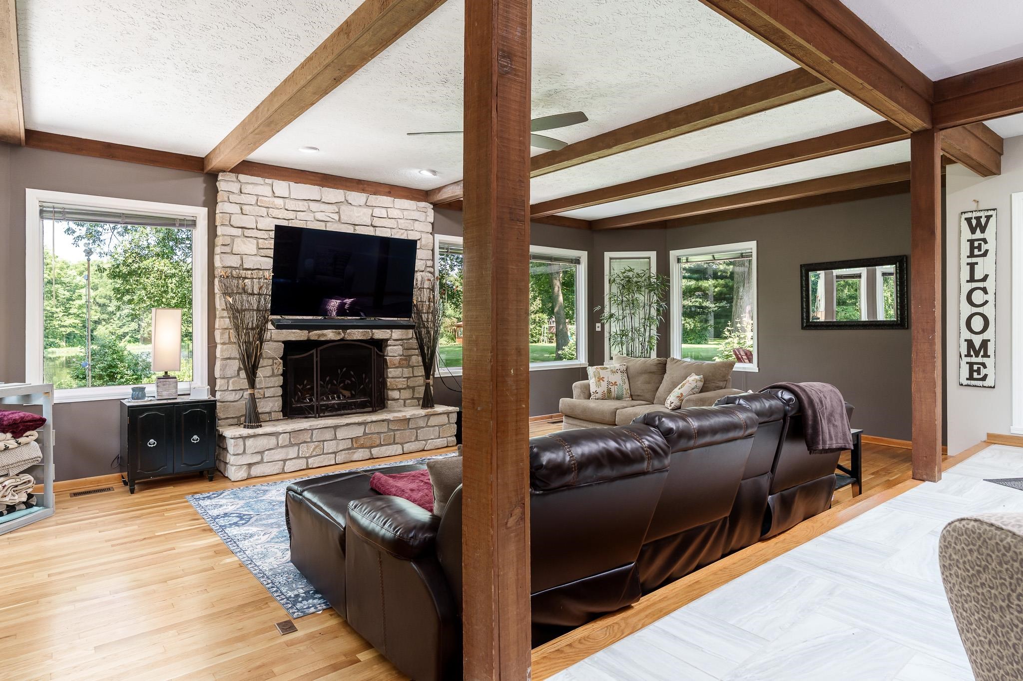 2373 Geddes Road Rockford, IL 61103 - Photo 16 of 97 a living room with furniture and a flat screen tv