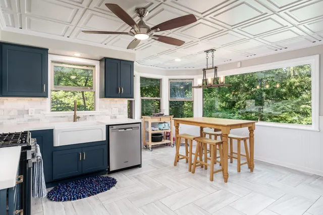 a kitchen with a sink and a window