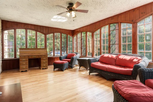 a living room with furniture and a window