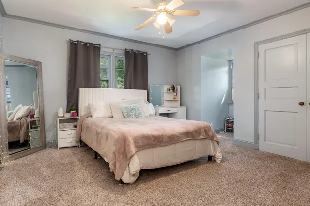 front view of a house with a yard