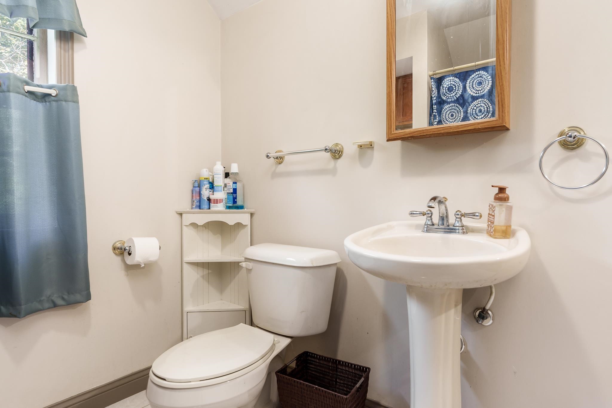2373 Geddes Road Rockford, IL 61103 - Photo 44 of 97 a bathroom with a sink mirror and toilet
