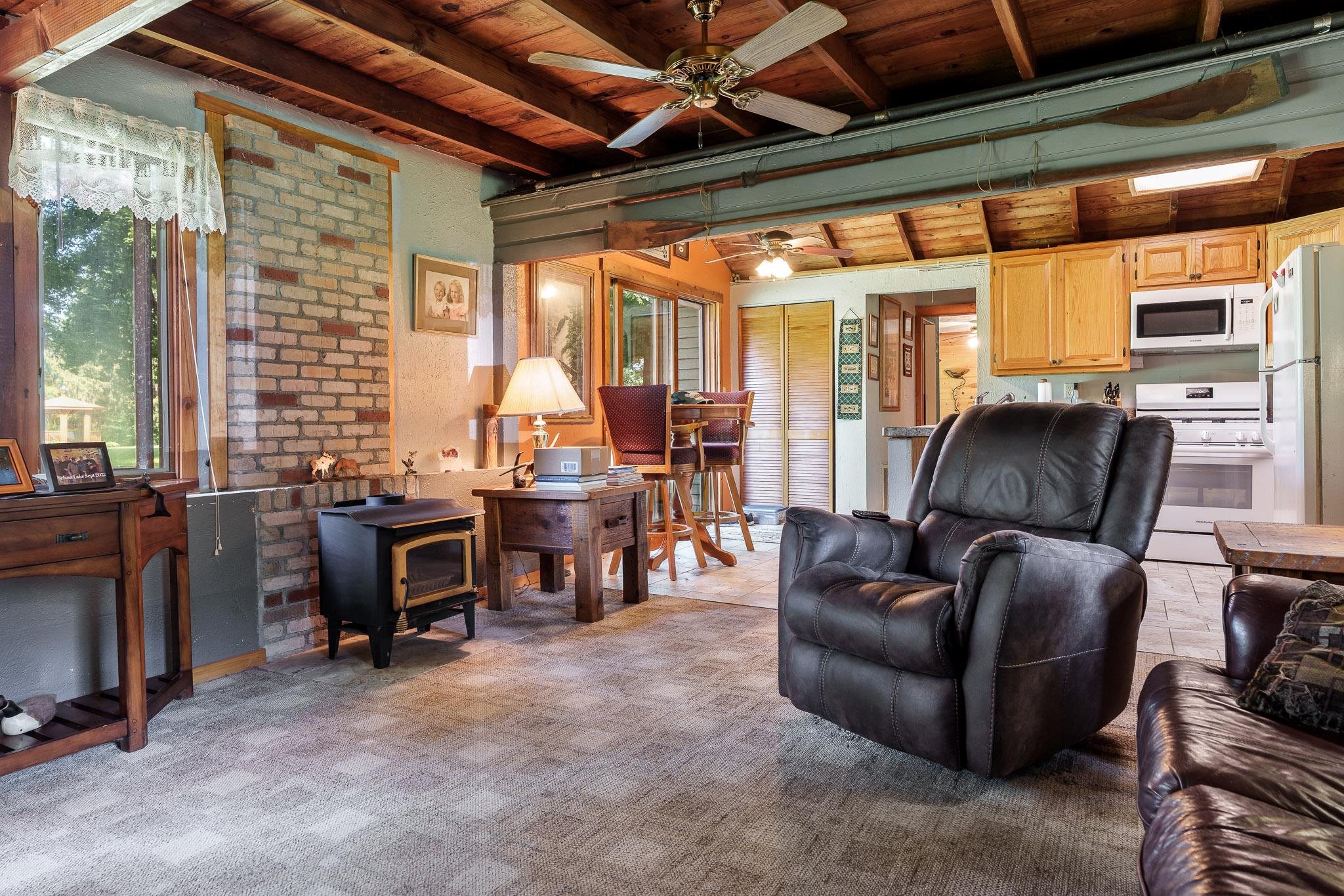 2373 Geddes Road Rockford, IL 61103 - Photo 47 of 97 a living room with furniture and a flat screen tv