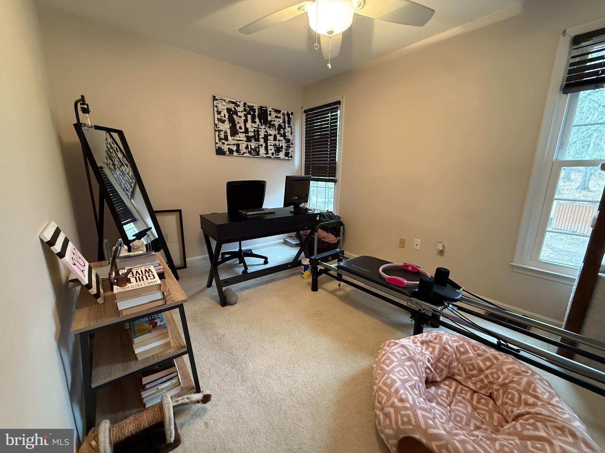2454 South Walter Reed Drive, Unit D Arlington, VA 22206 - Photo 9 of 11 a room with furniture and a flat screen tv