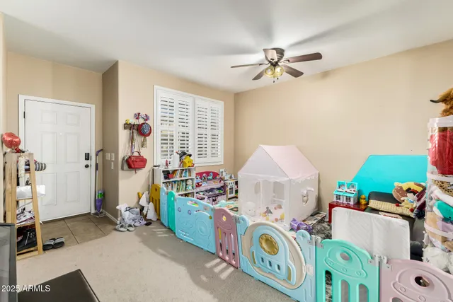 a room with toys and a wooden floor