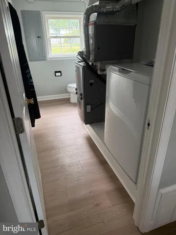 a room with window and furniture