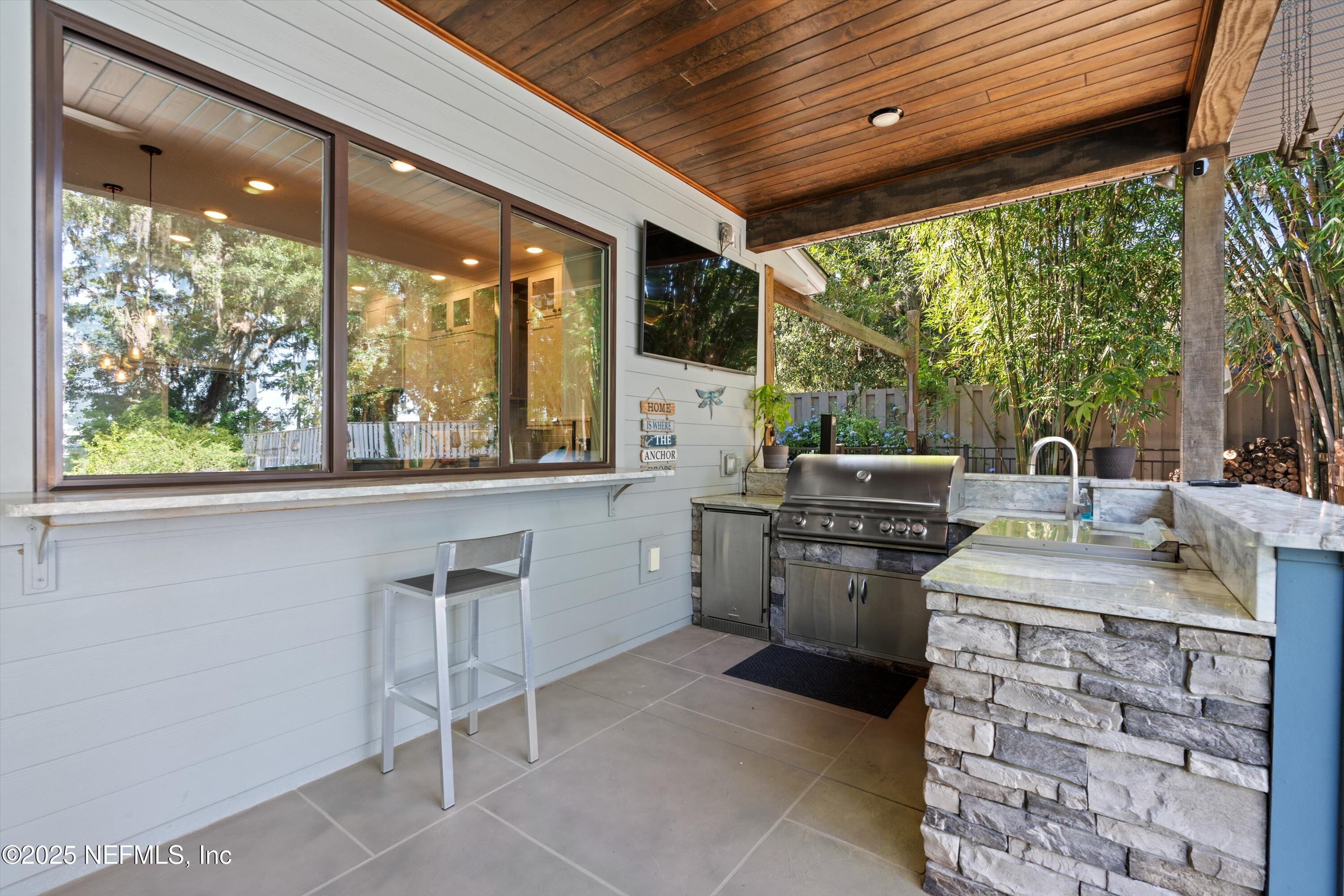 182 North Ridge Drive Fleming Island, FL 32003 - Photo 54 of 75 52-Outdoor Kitchen