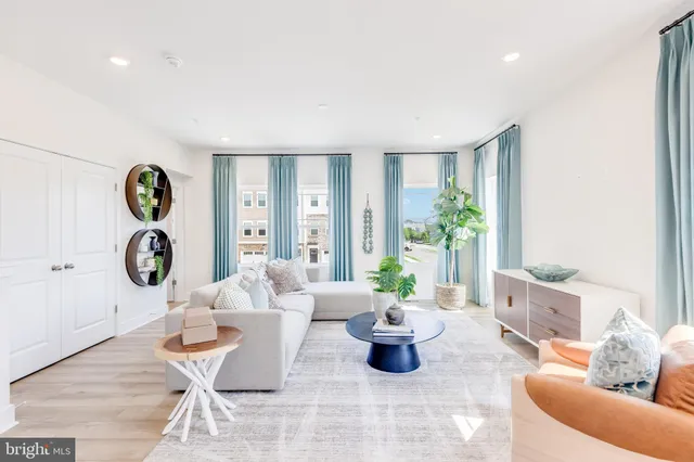 a living room with furniture and window