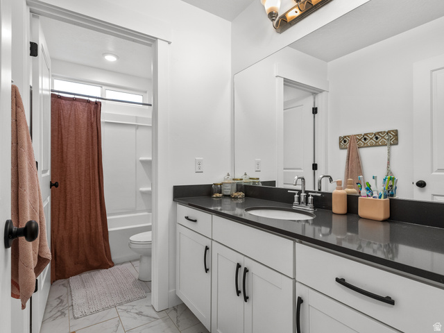 627 South Meade Street Mapleton, UT 84664 - Photo 33 of 48 Bathroom featuring a white vanity with dark countertops and a large mirror