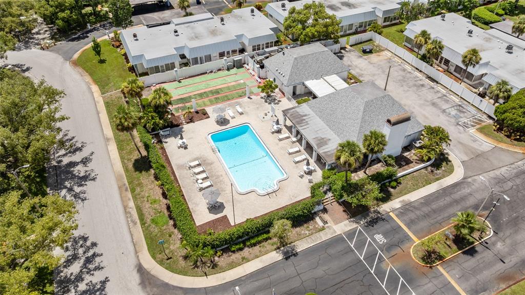 4237 Redcliff Place New Port Richey, FL 34652 - Photo 22 of 25 an aerial view of a house with a swimming pool
