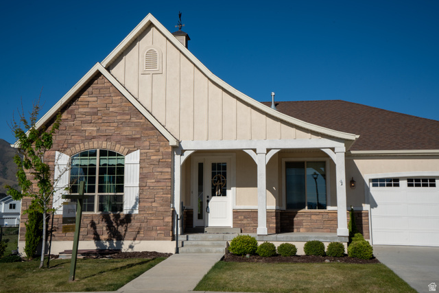 1222 West 190th Street North Mapleton, UT 84664 - Photo 46 of 46 Exterior featuring stone veneer and vertical siding accents