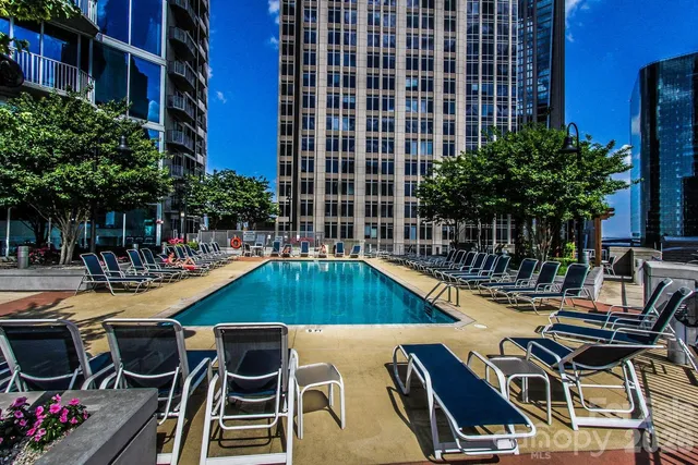 a room with gym equipment and a large window