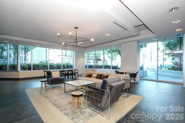 an open kitchen with a table and chairs
