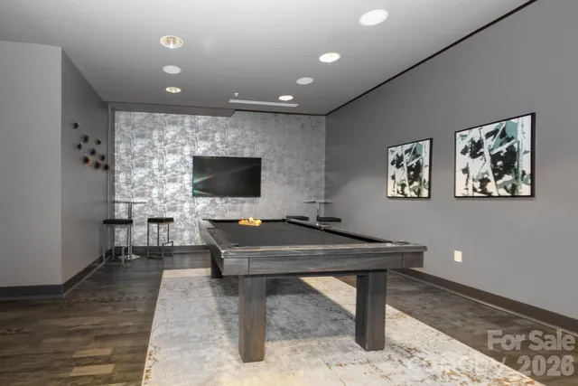 a view of a balcony with chairs