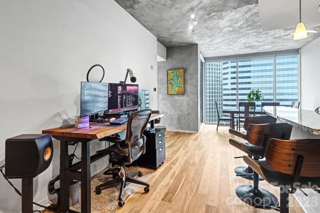 a kitchen with stainless steel appliances granite countertop a stove and a refrigerator