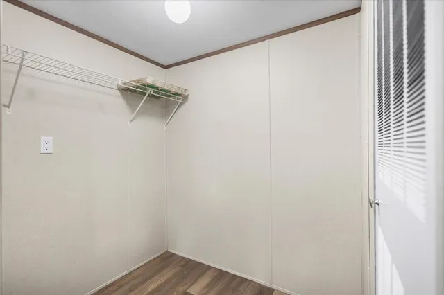 a view of a room with racks on the wall