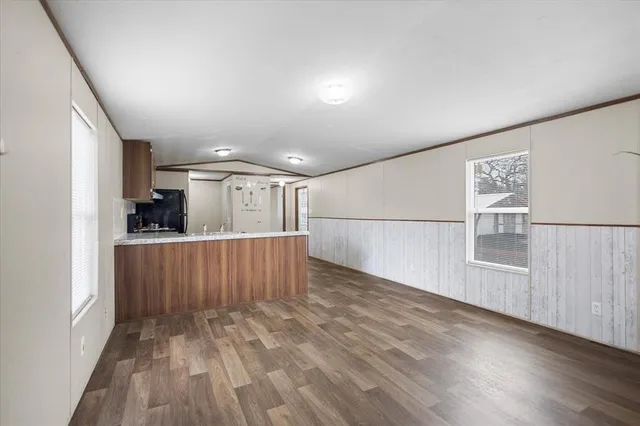 a view of entryway with wooden floor