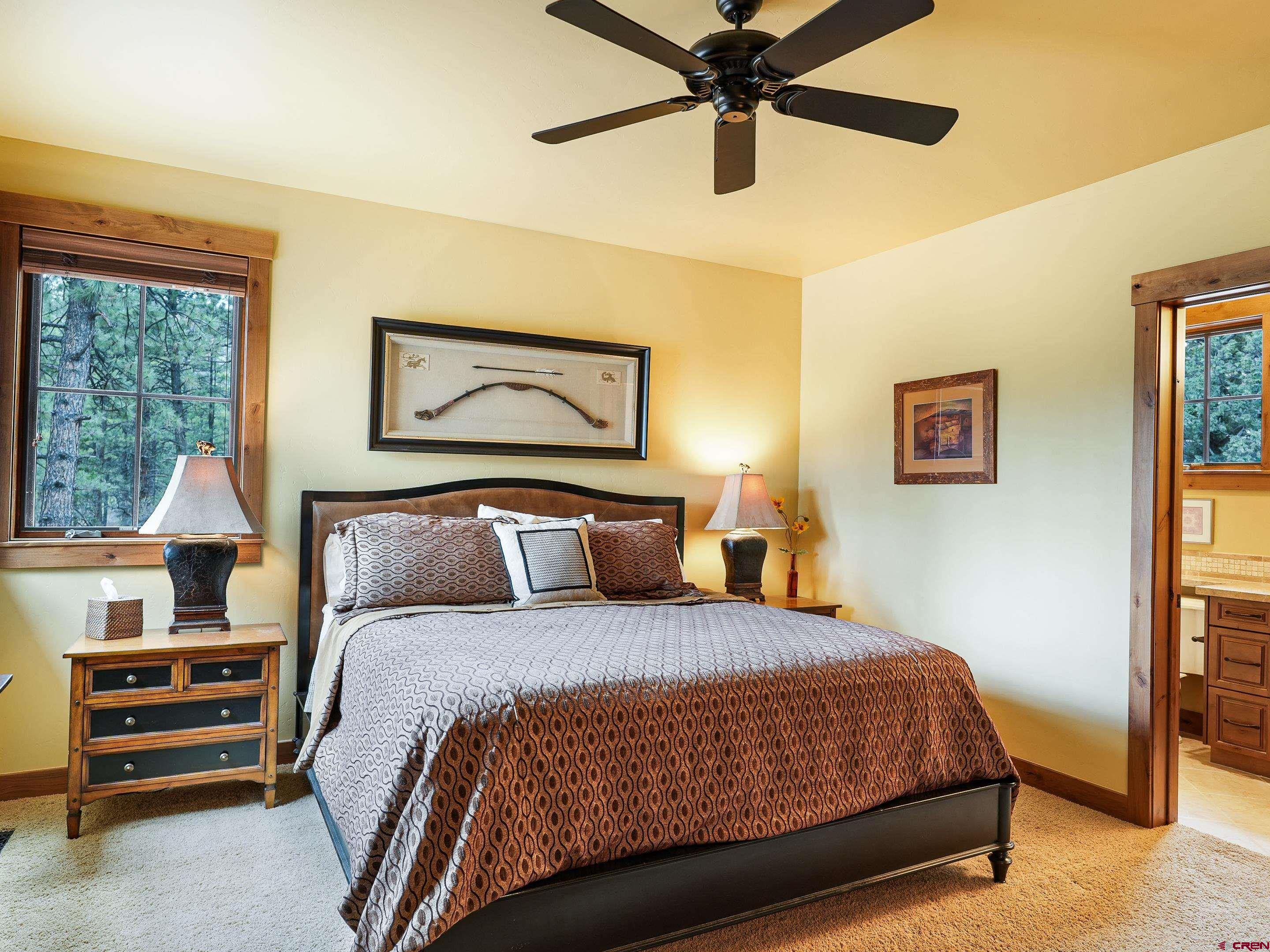 77 Ambush Canyon Durango, CO 81301 - Photo 17 of 25 a bedroom with a bed and a window