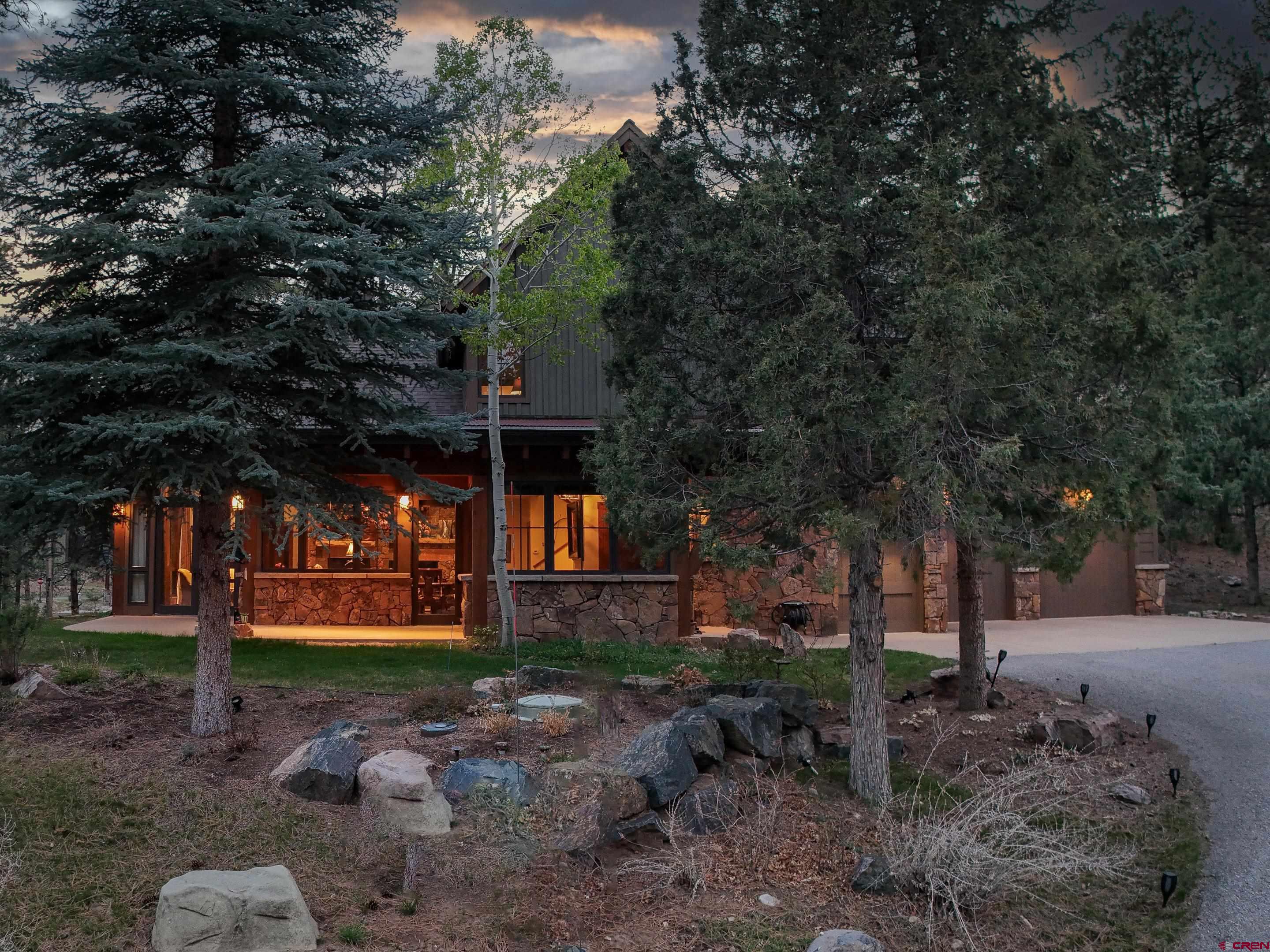 77 Ambush Canyon Durango, CO 81301 - Photo 24 of 25 front view of a house with a tree