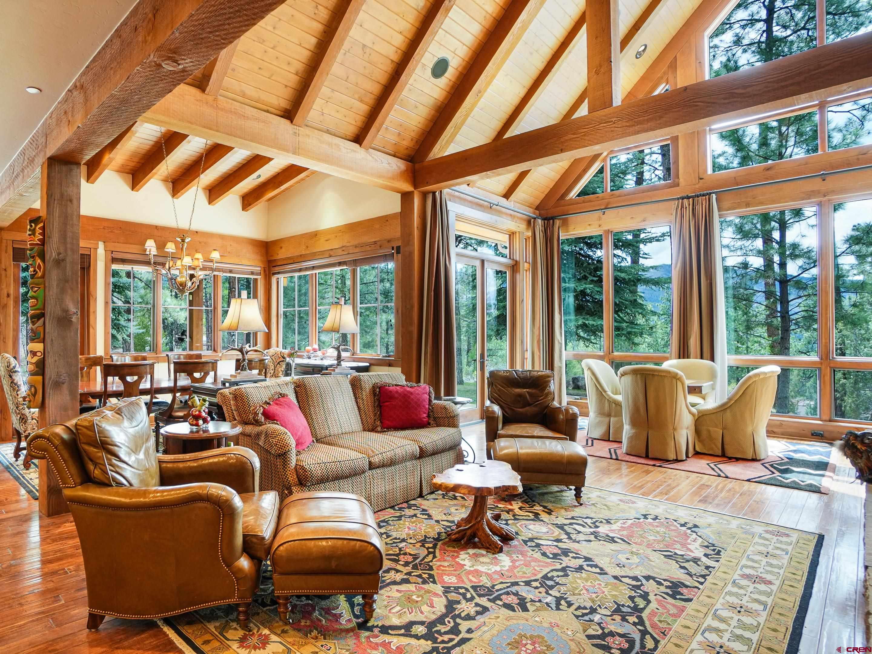 77 Ambush Canyon Durango, CO 81301 - Photo 9 of 25 a living room with furniture and a large window