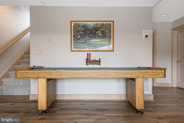 a bathroom with a toilet sink and vanity