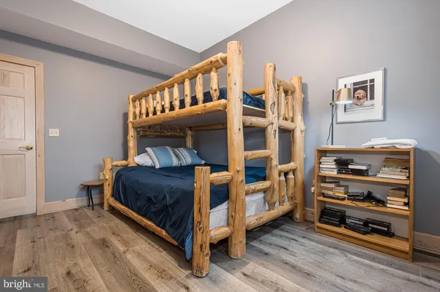 a view of backyard with green space and deck