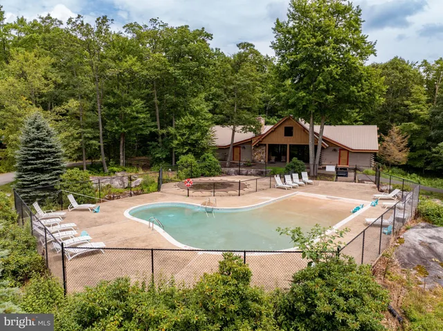 a view of balcony with deck and couches