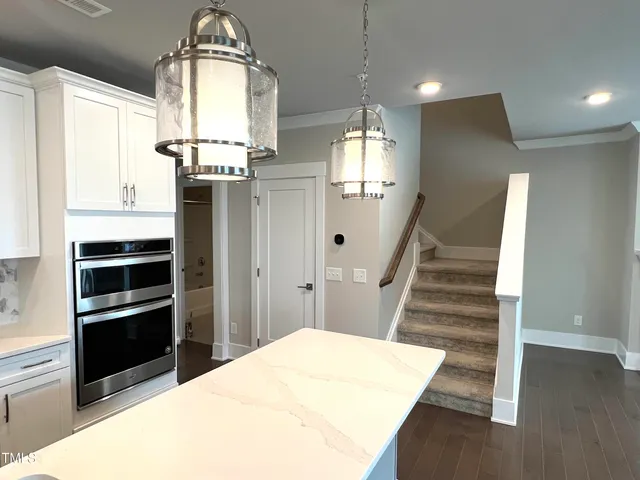 a bathroom with a sink a toilet and bathtub