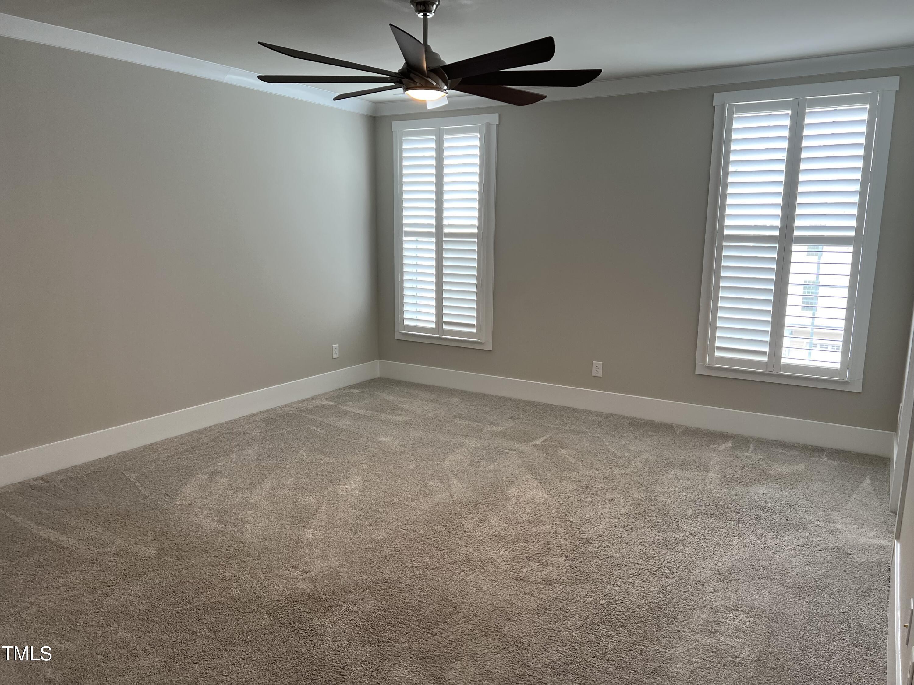 10530 Sablewood Drive, Unit 113 Raleigh, NC 27617 - Photo 21 of 61 a view of an empty room with a window