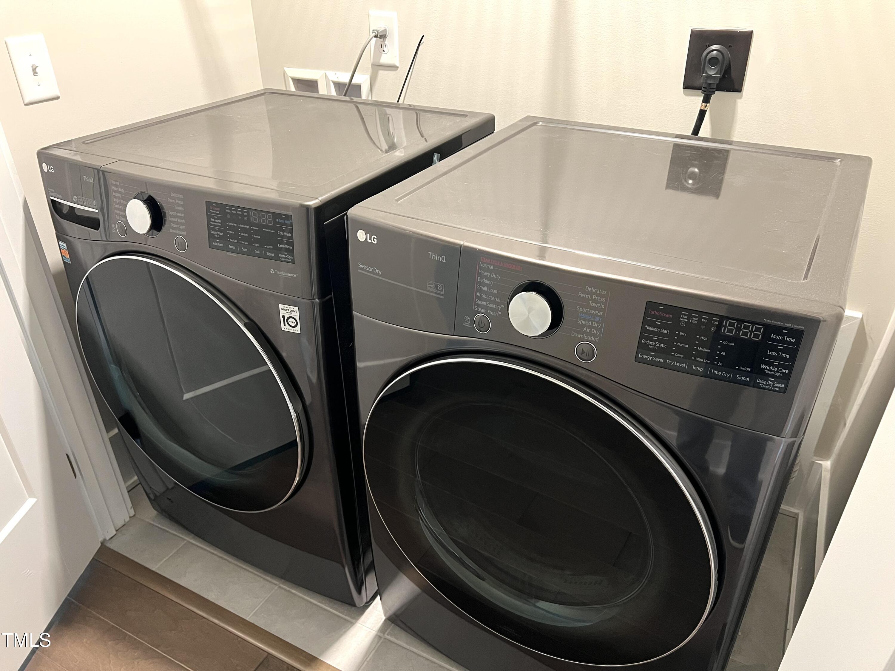 10530 Sablewood Drive, Unit 113 Raleigh, NC 27617 - Photo 32 of 61 a utility room with dryer and washer