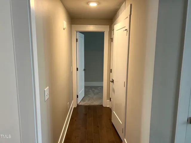 a view of empty room with floor to ceiling window