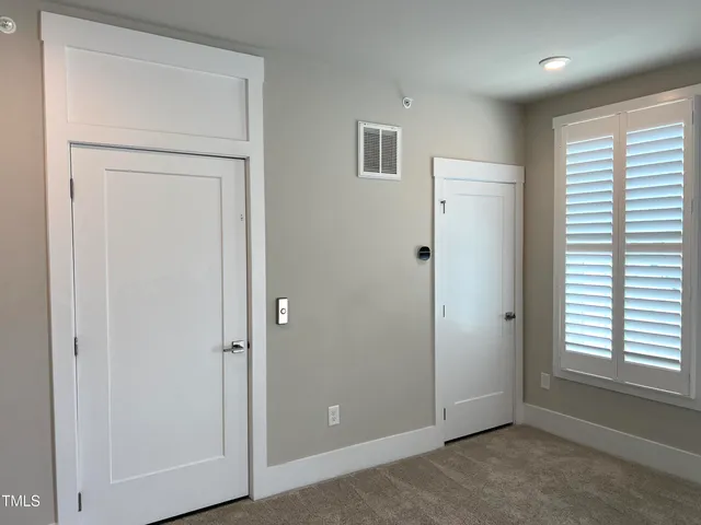 a view of a balcony with city view