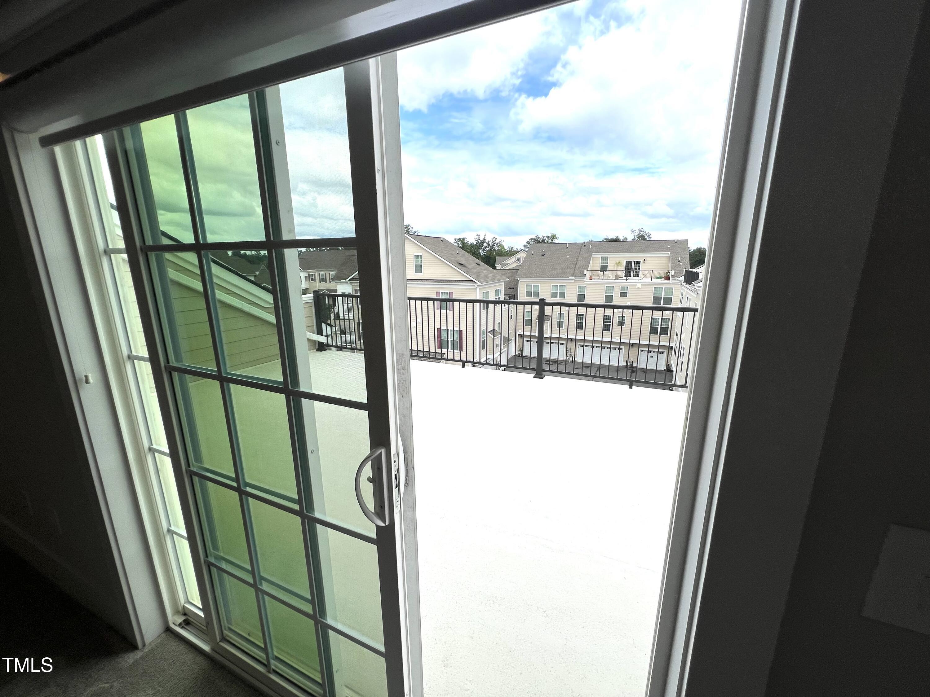 10530 Sablewood Drive, Unit 113 Raleigh, NC 27617 - Photo 46 of 61 a view of a glass door