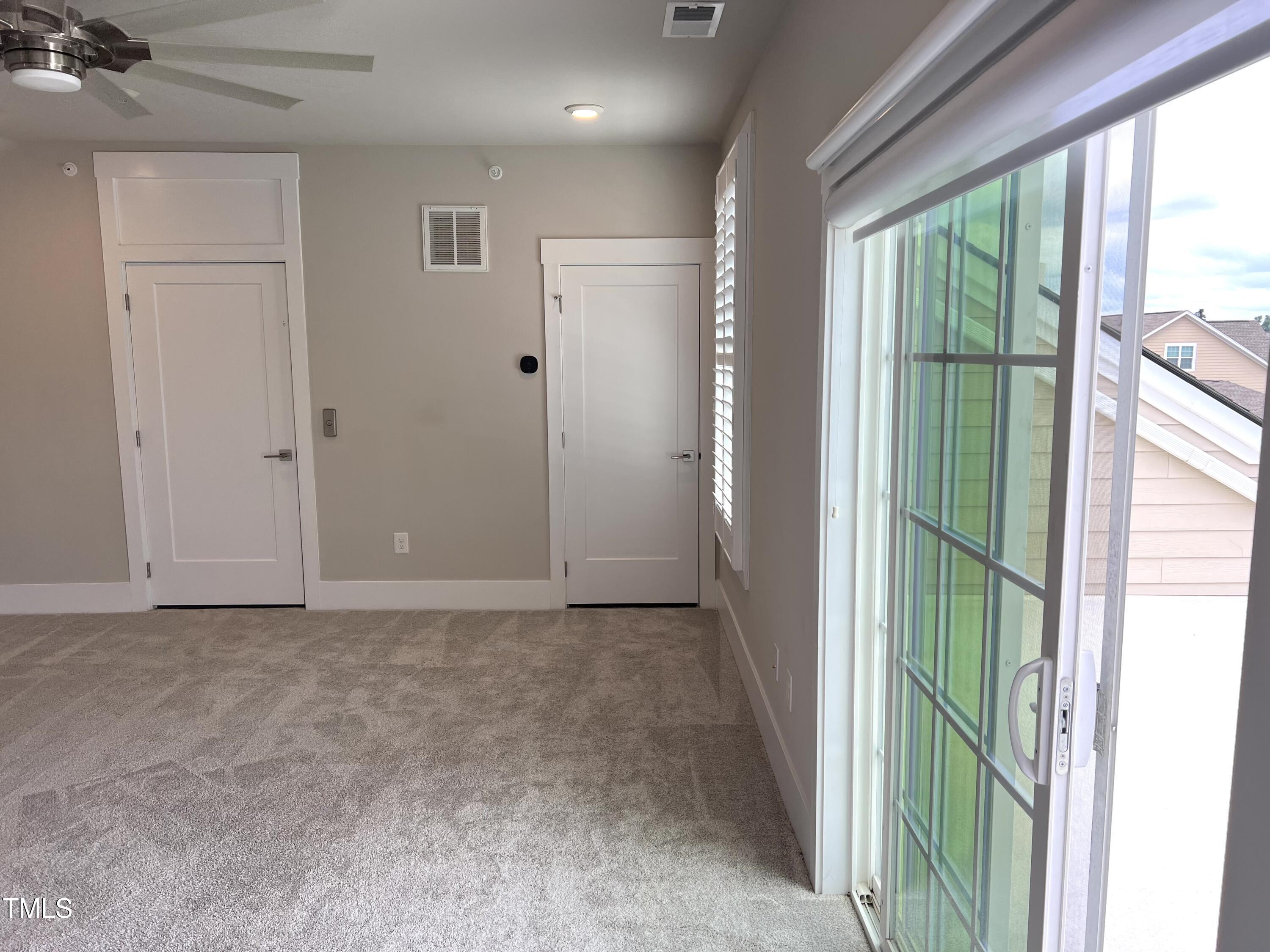 10530 Sablewood Drive, Unit 113 Raleigh, NC 27617 - Photo 53 of 61 a view of an empty room with a window