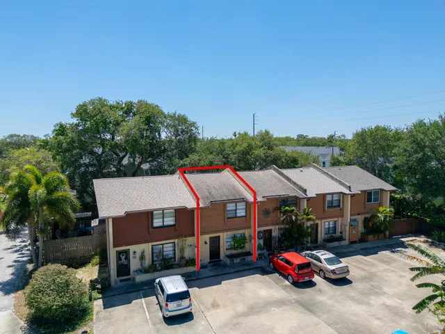 a view of a bench in the backyard