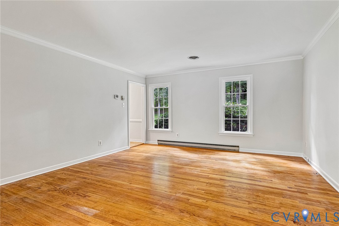 10478 Gould Hill Road Hanover, VA 23069 - Photo 21 of 63 Hardwood flooring, crown molding, two casement win