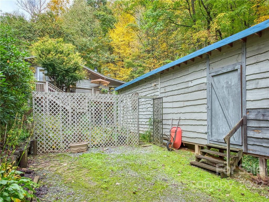2660 Hemphill Road Waynesville, NC 28785 - Photo 38 of 43 a front view of a house with a yard