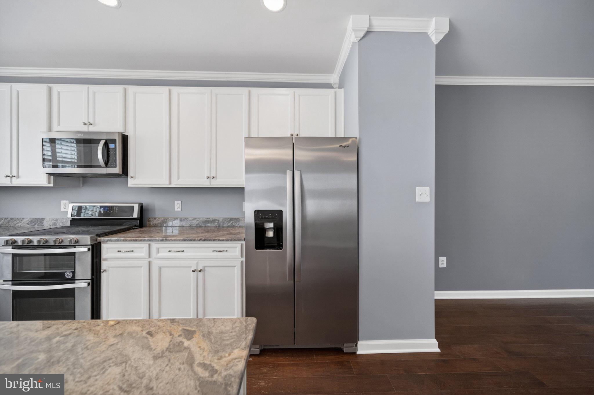 8475 Randell Ridge Road Frederick, MD 21704 - Photo 11 of 36 Modern kitchen with sleek appliances.