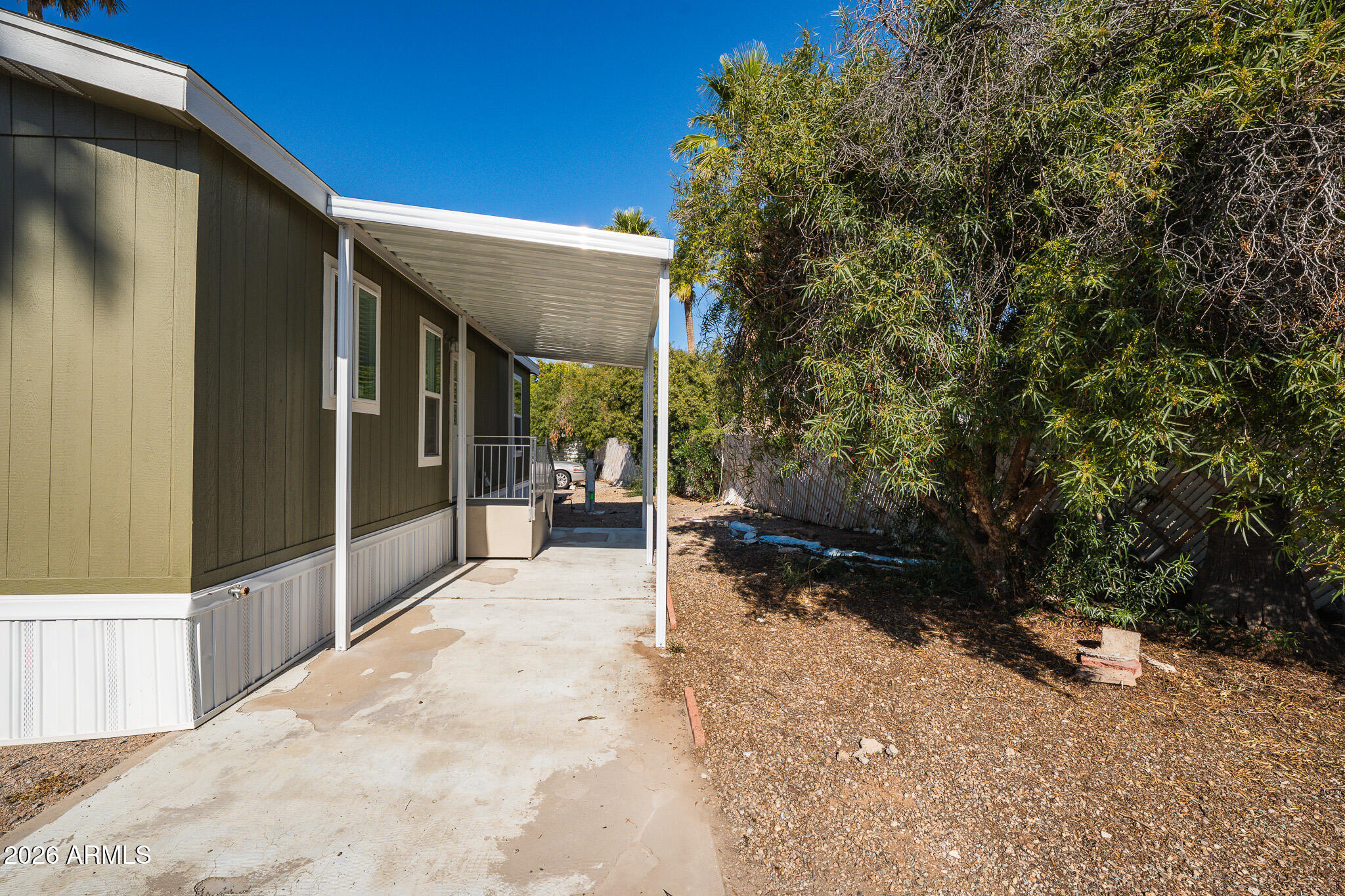 1250 East Bell Road, Unit 11 Phoenix, AZ 85022 - Photo 20 of 24 a view of a backyard of a house