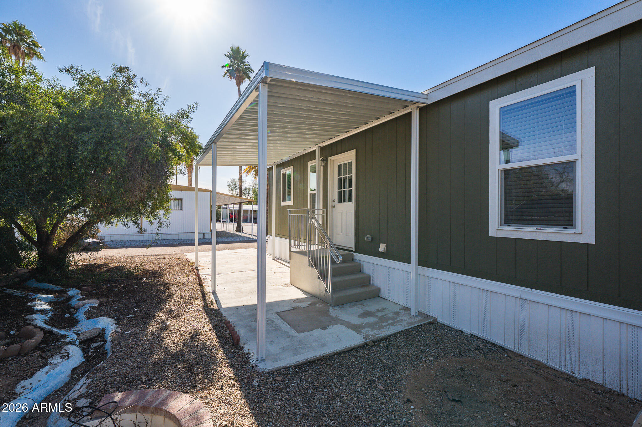 1250 East Bell Road, Unit 11 Phoenix, AZ 85022 - Photo 22 of 24 a view of a house with backyard and sitting area