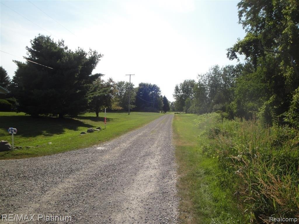 3901 North Burkhart Road Howell, MI 48855 - Photo 13 of 26 View down road to West