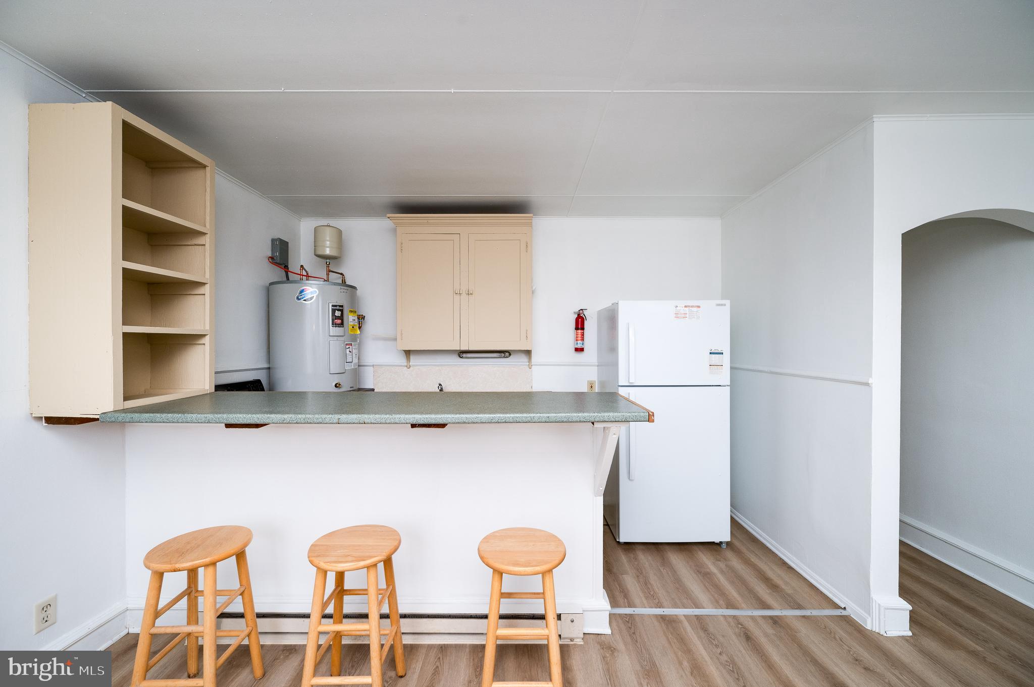 302-4 West Main Street Kutztown, PA 19530 - Photo 11 of 37 a kitchen with stainless steel appliances a sink and a refrigerator